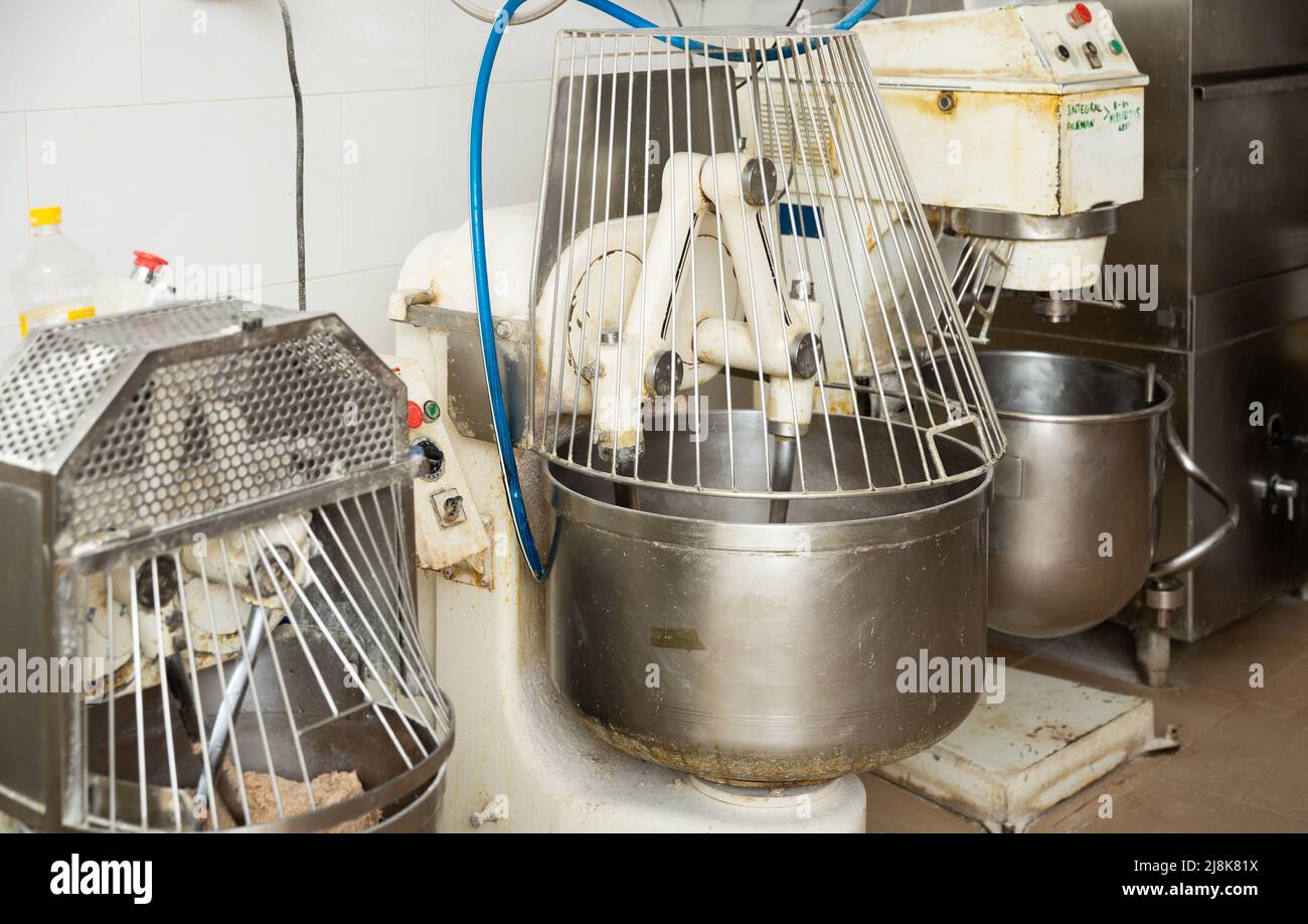 Kneading machine preparing dough Stock Photo Alamy