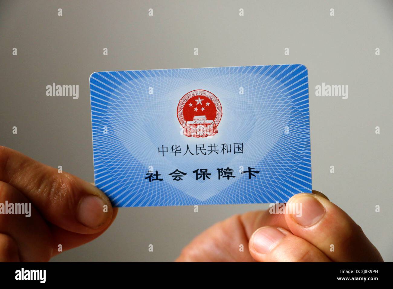 BEIJING, CHINA MAY 5, 2022 A resident shows a social security card on May 5, 2022 in Beijing