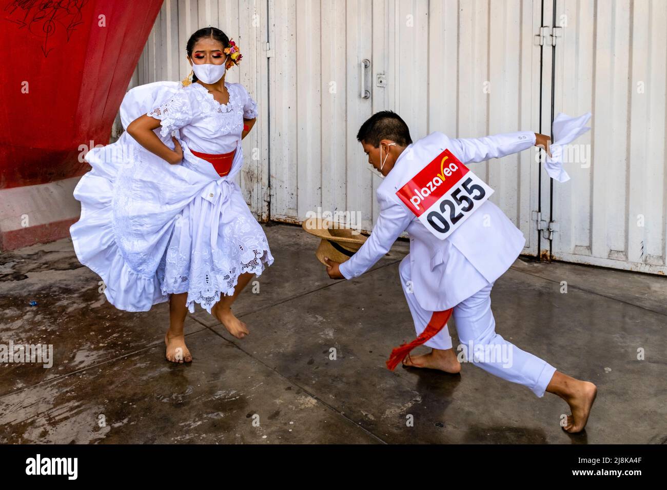 Child Dancers Practise The Marinera Dance Before Taking Part In A