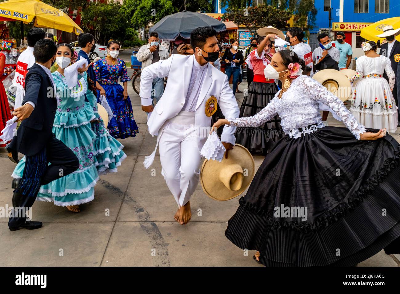 Young Peruvian Dancers Practise The Marinera Dance Before Taking