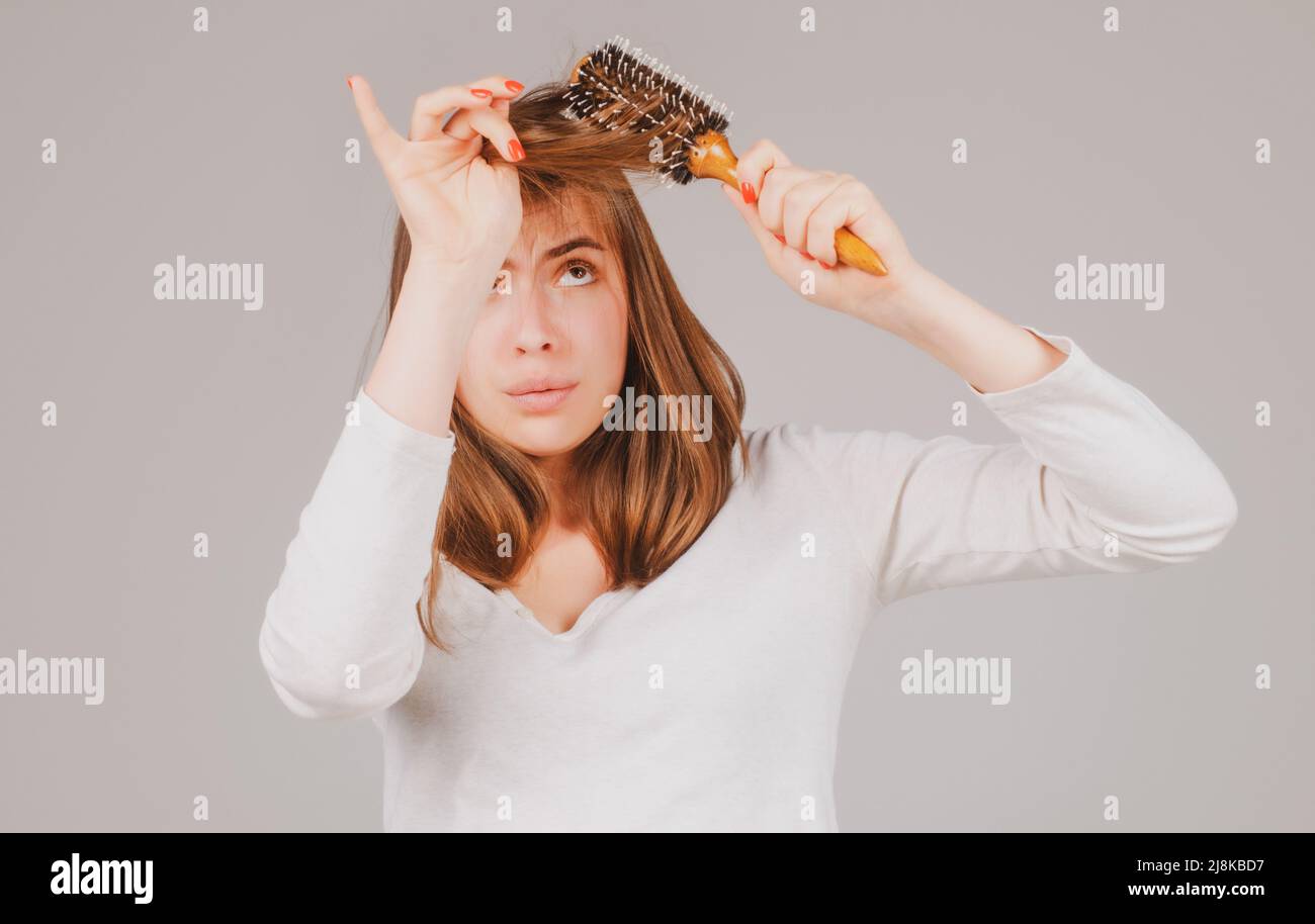Hair for hair loss problem, woman show her hair tangled damaged hair