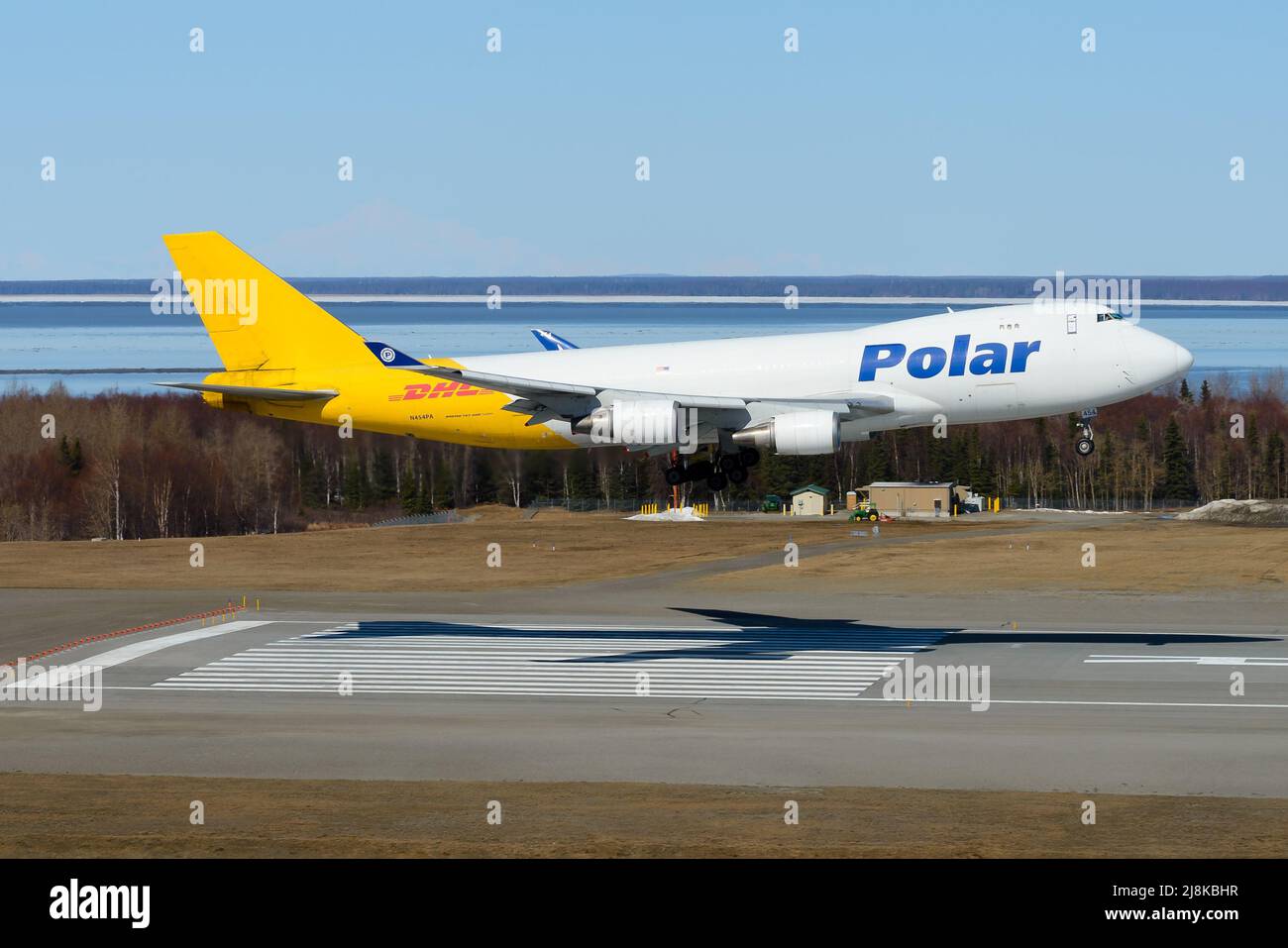 Polar Air Cargo Boeing 747-400 airplane landing. Plane 747-400F for cargo transport of Polar Air arriving. Aircraft 747-400 freighter N454PA for DHL. Stock Photo