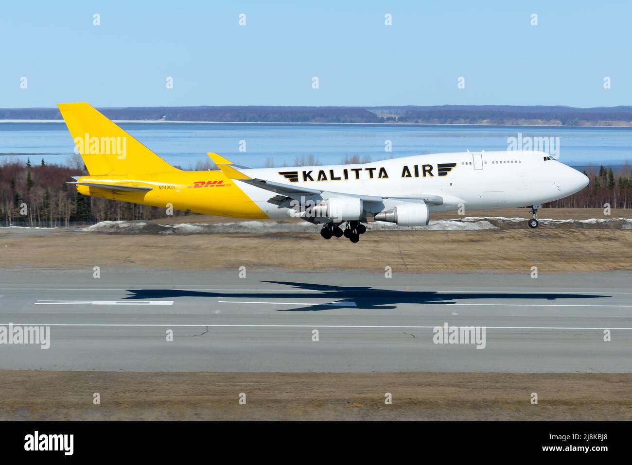 Kalitta Air Boeing 747-400F airplane landing. Plane 747-400 for cargo transport of DHL Kalitta Air arriving. Aircraft 747-400 freighter N740CK for DHL. Stock Photo