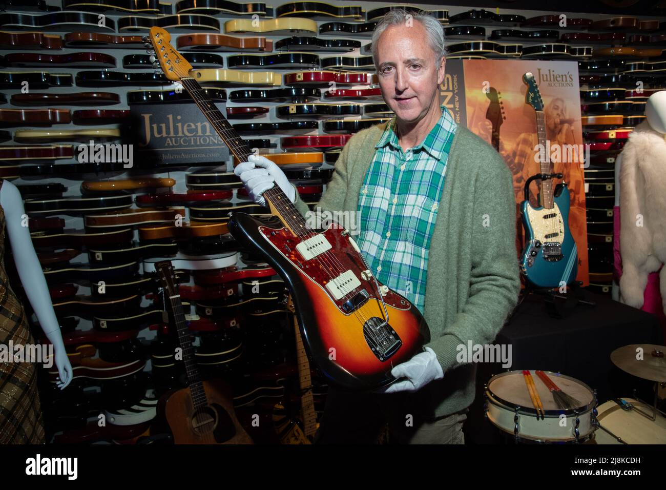 A 1964 Fender Jazzmaster electric guitar owned by Jimi Hendrix is displayed by Julien's Auctions CFO Martin Nolan at the media preview of the 'Music I Stock Photo