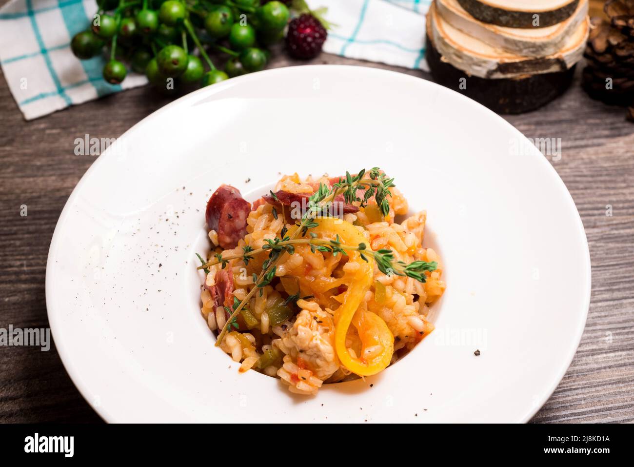 Creole Jambalaya, aka New Orleans paella, rice in tomato sauce with ham and vegetables Stock Photo