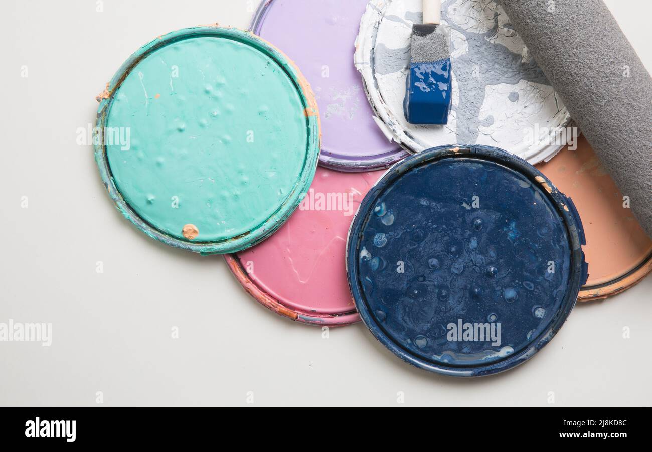 multi color old paint can lids Stock Photo Alamy