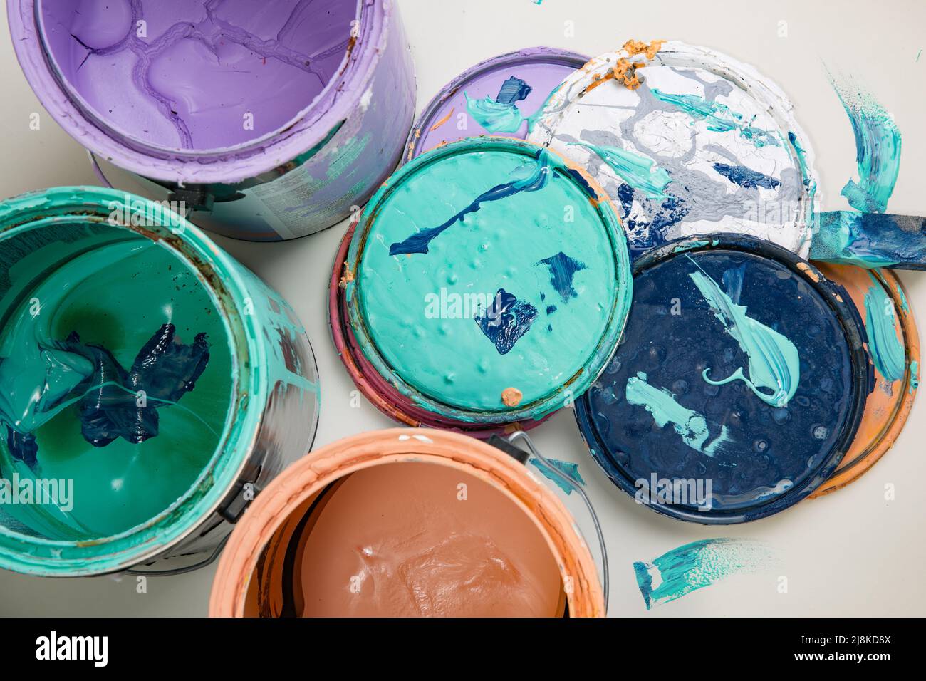 multi color old paint can lids Stock Photo Alamy