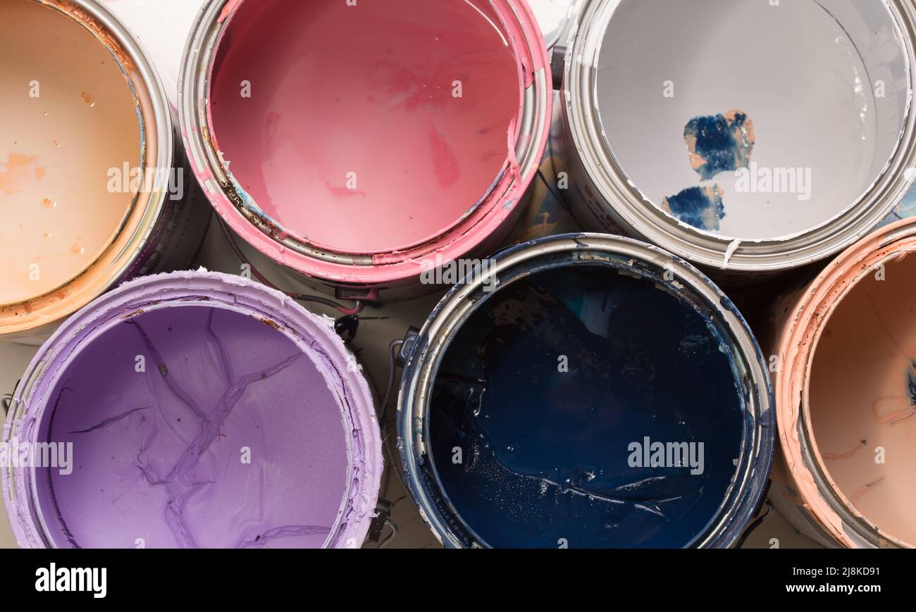 multi color old paint cans on a white background isolated Stock Photo