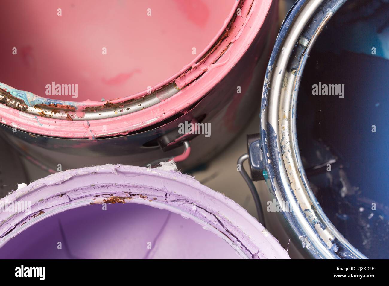 multi color old paint cans on a white background isolated Stock Photo