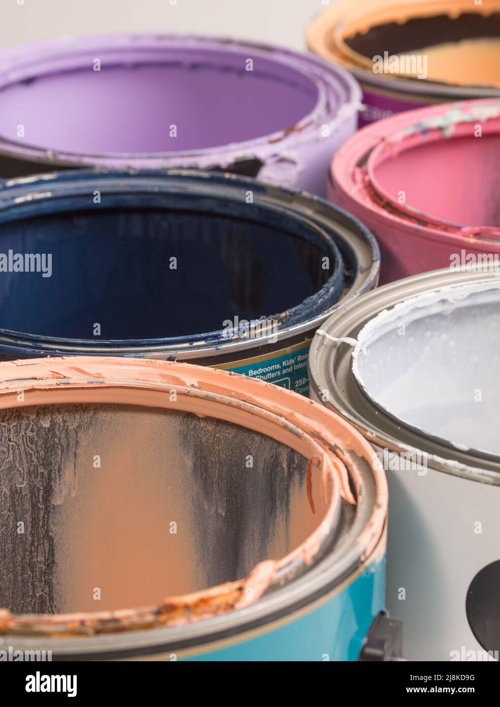 multi color old paint cans on a white background isolated Stock Photo