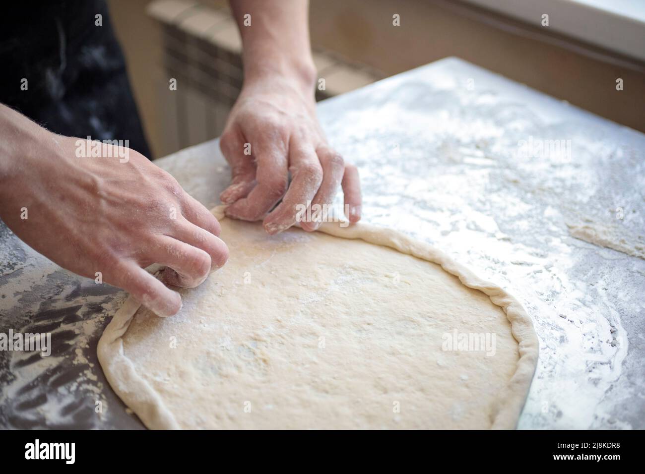 hands of the cook kneading pizza dough close-up Stock Photo - Alamy