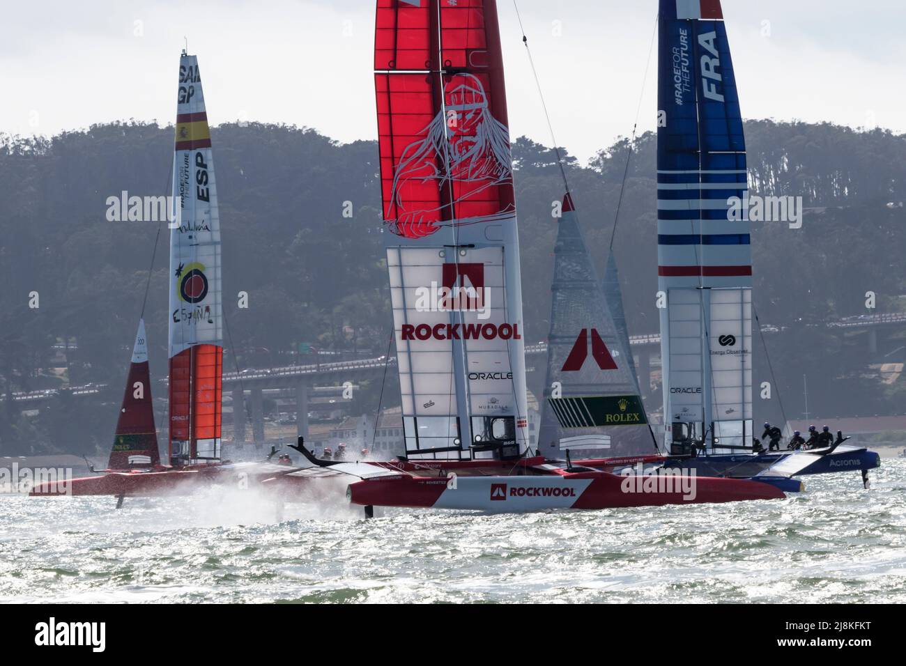 The Denmark F50 catamaran follows the racing boats of Spain and France around the buoy on the waters of San Francisco Bay during the 2022 SailGP races Stock Photo