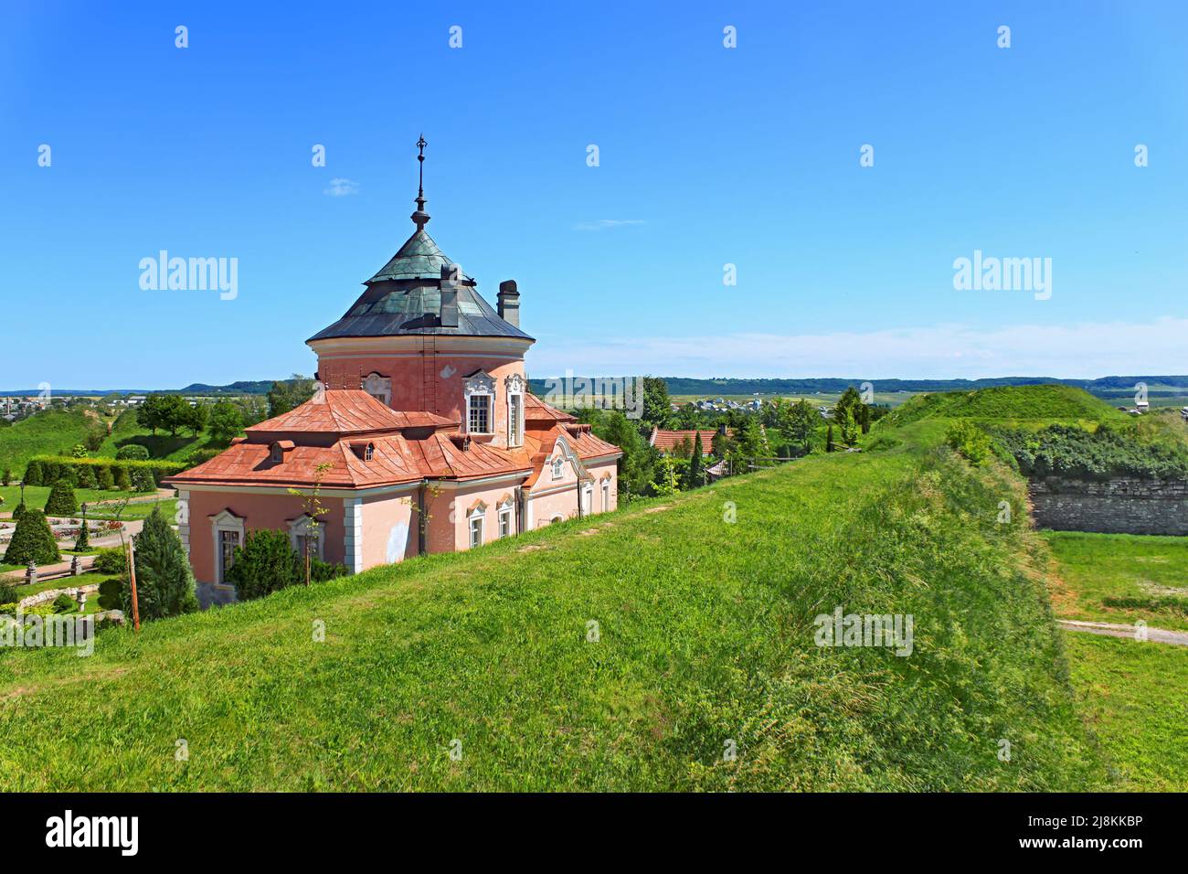 So-called Chinese Palace is one of the oldest buildings of the Zolochiv Castle Museum-Reserve, a view from the earthen fortifications embankment, a su Stock Photo