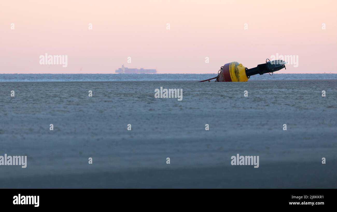 Stranded buoy on East Frisian Island of Spiekeroog, Germany Stock Photo