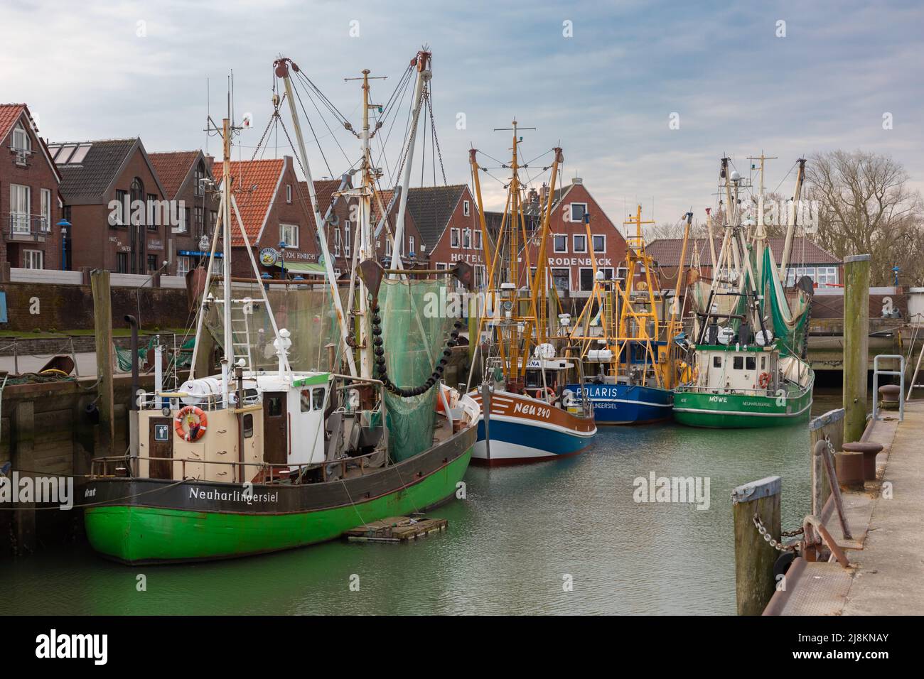 Typical fishing boats in Neuharlingersiel harbour, Germany Stock Photo