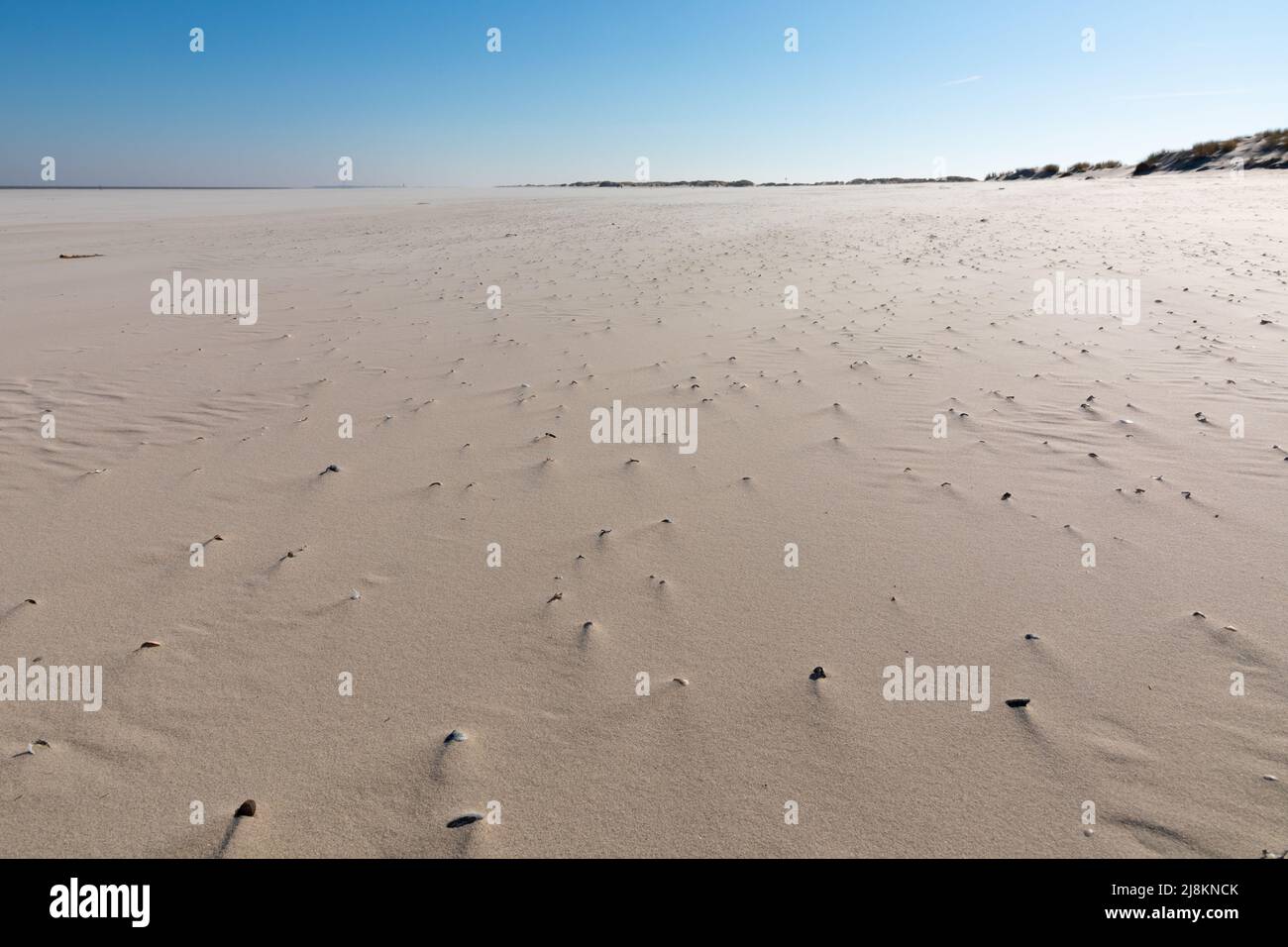 Endless empty sandy beach of Spiekeroog, Germany Stock Photo