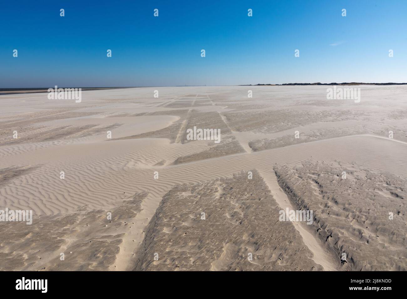 Endless empty sandy beach of Spiekeroog, Germany Stock Photo