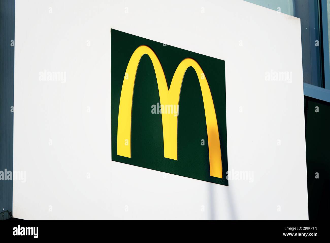 McDonald's logo sign outside. Stock Photo