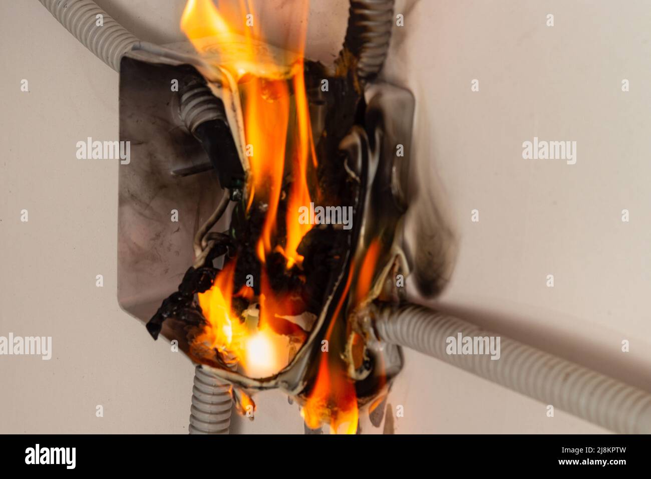 The wires in the electrical panel caught fire, creating a dangerous