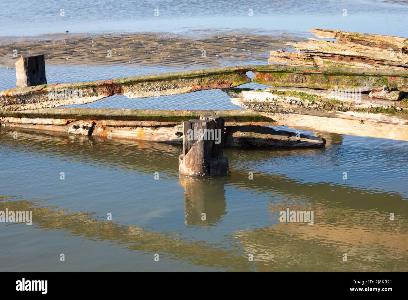 Remains of old jetty on the East Frisian island of Spiekeroog, Germany Stock Photo