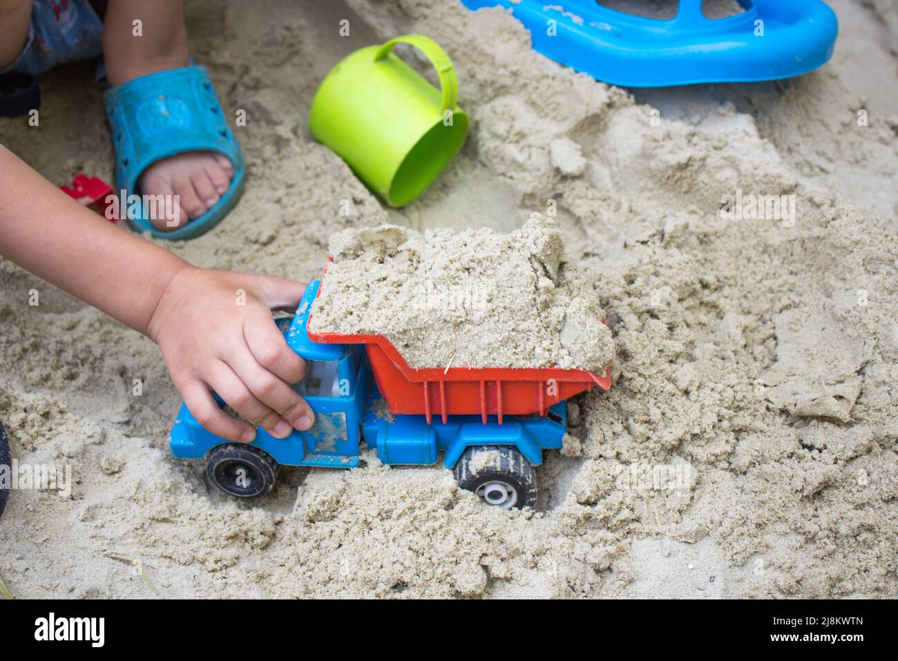 Boy playing machine Stock Photo - Alamy