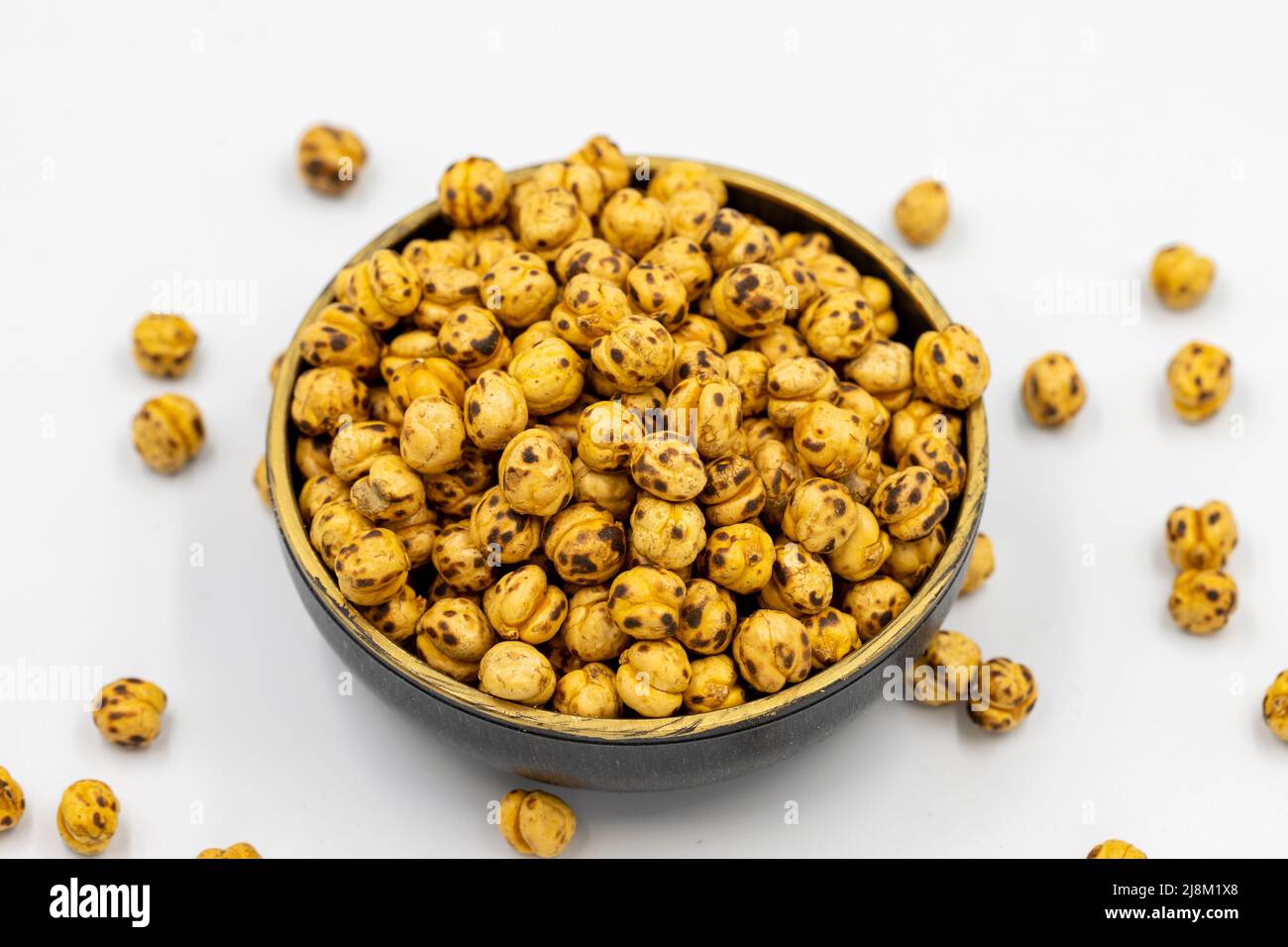 Roasted chickpeas on a white background. Close-up. local name leblebi