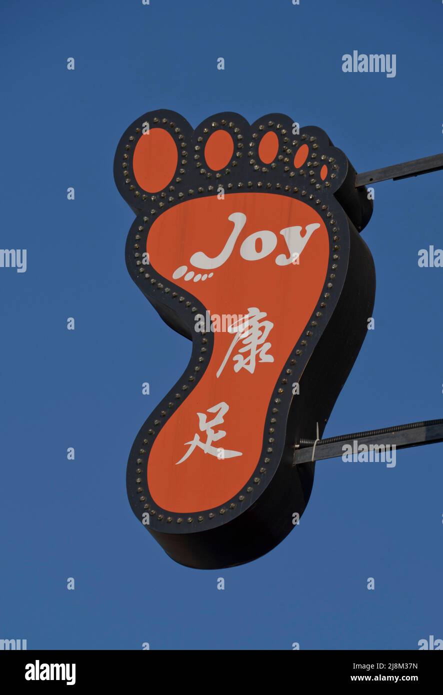Sign for traditional foot massage clinic in the streets of Town