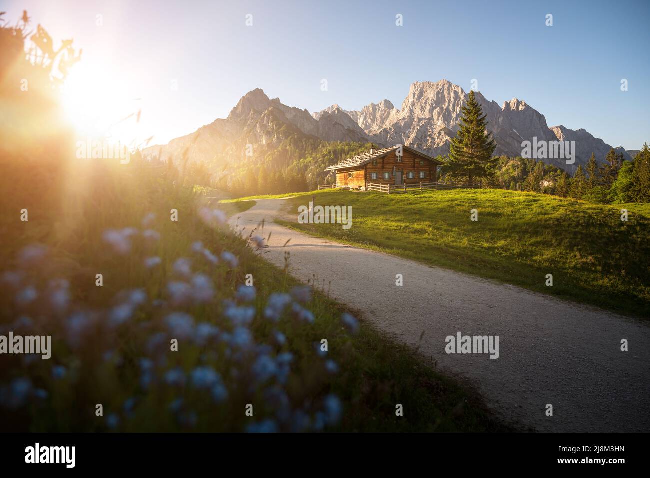 Idyllic alpine hut in front of a beautiful mountain backdrop Stock ...