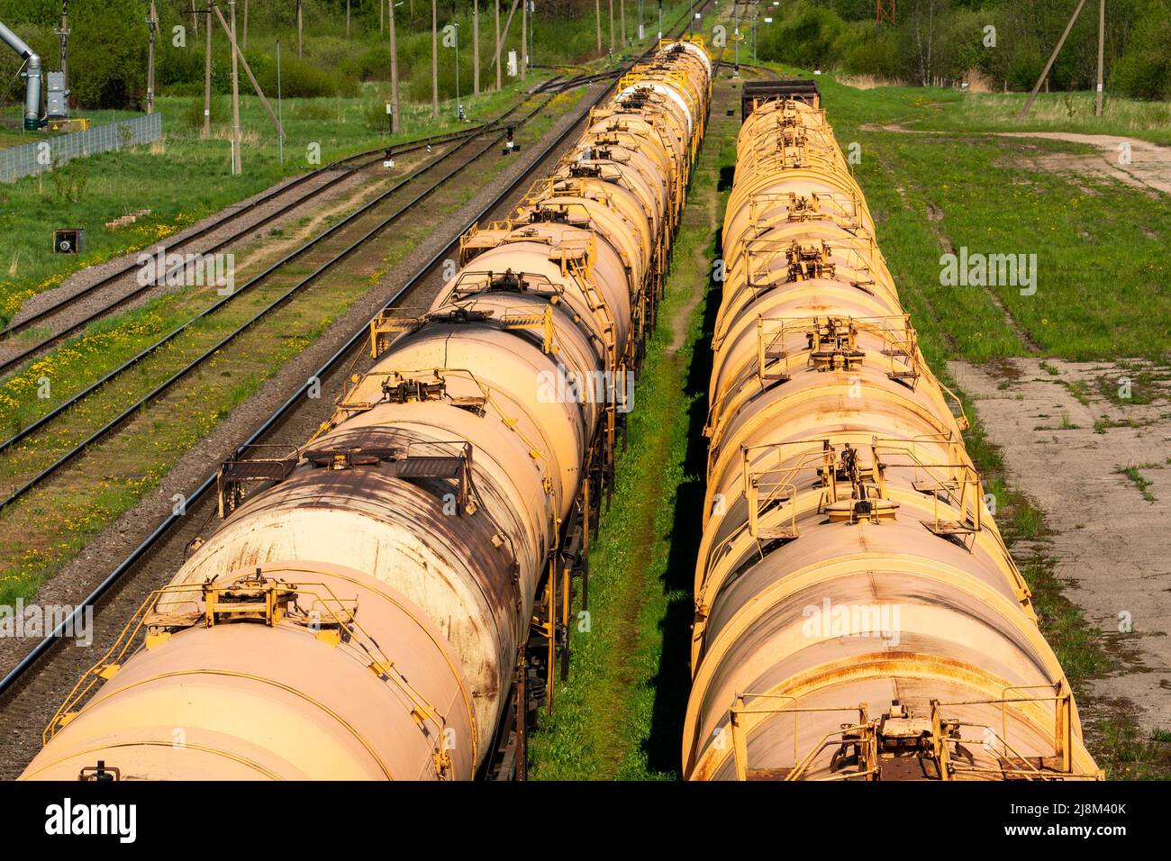 Set of tanks with oil and fuel transport by rail. Freight cars and