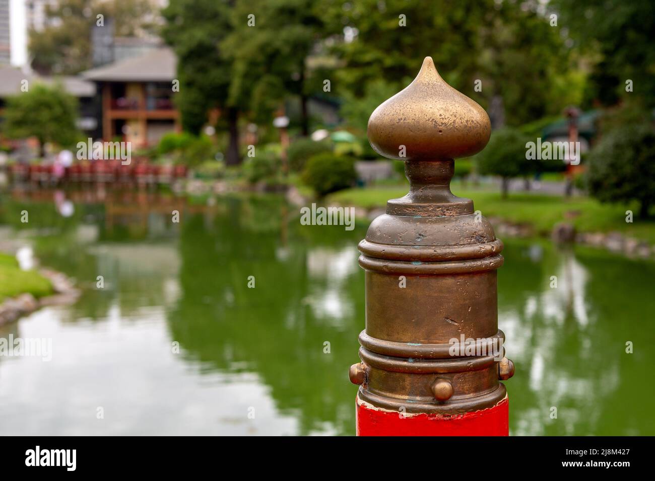 photograph of bridge post in japanese park Stock Photo - Alamy