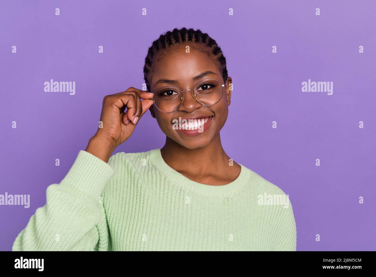 Portrait of pretty cheerful young business lady wear spectacles work marketing isolated on violet color background Stock Photo