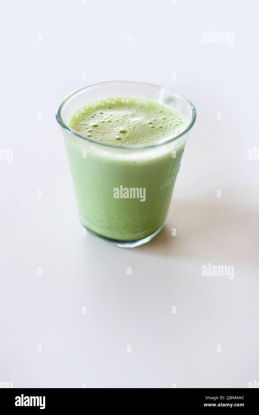 Macha Latte | Japanese Green Tea Glass cup Hot Drink isolated on white Stock Photo