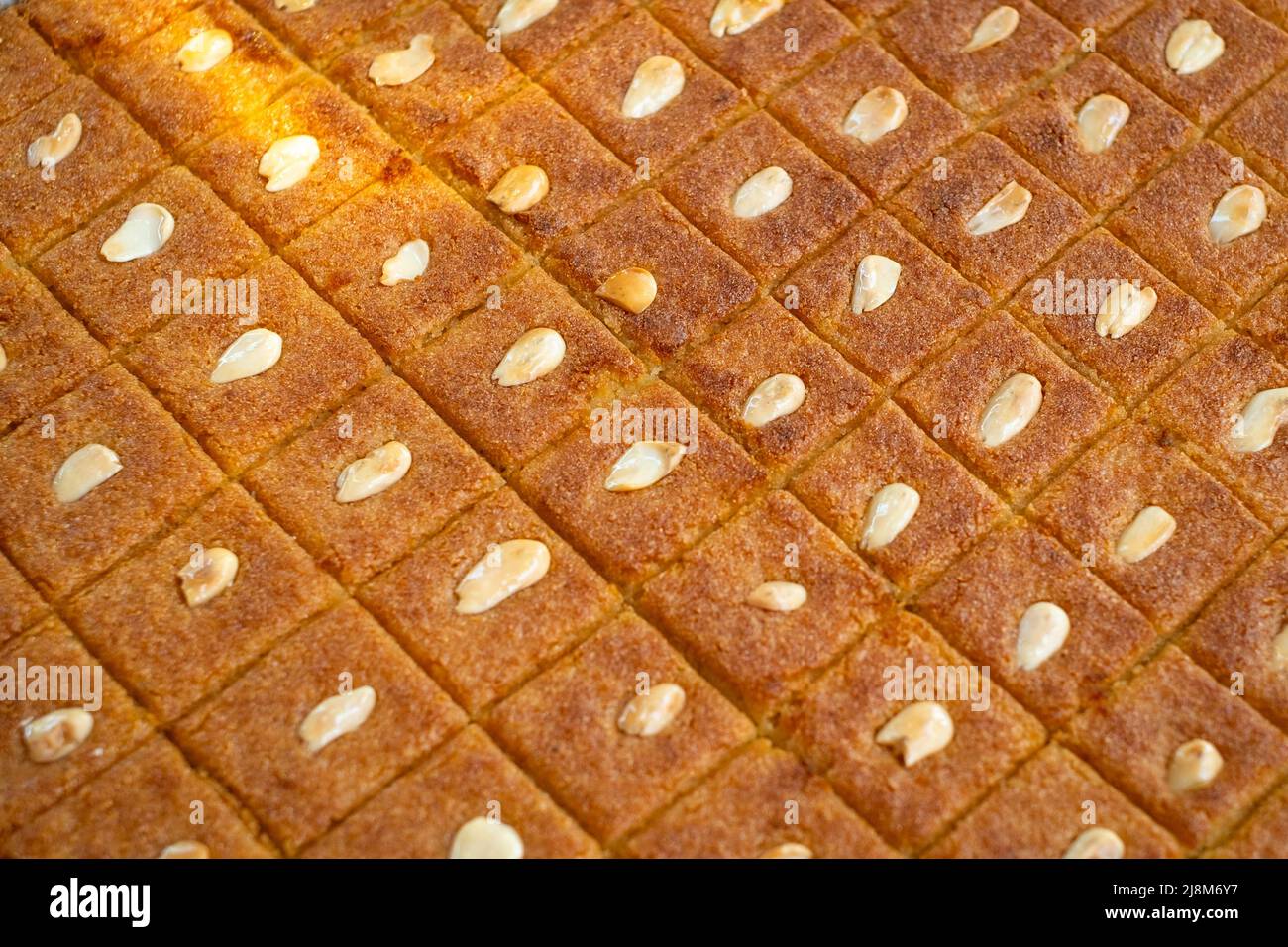 arabic sweets (Basbousa) dessert, baklava or baklawa closeup Stock