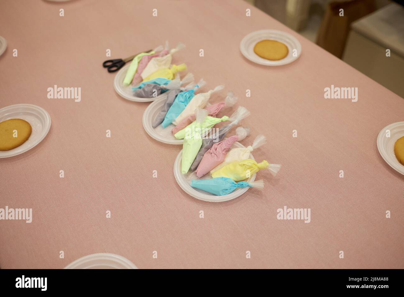 Preparation of gingerbread. The confectioner is painting gingerbread ...