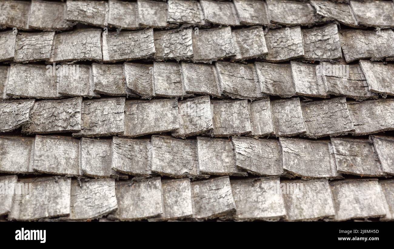 Traditional wooden roof tile of old house. Flat lay photo Stock Photo