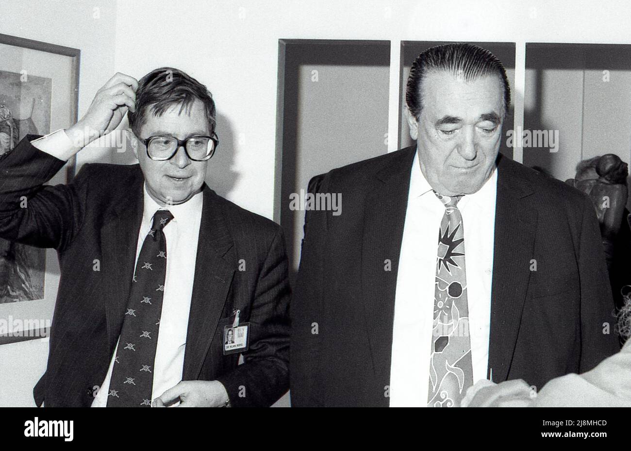 Dr. Alan Borg (left), Director General of the Imperial War Museum, attends a press event with Robert Maxwell, Chairman of Mirror Group Newspapers, at the Imperial War Museum in London, England on April 17, 1991. Stock Photo