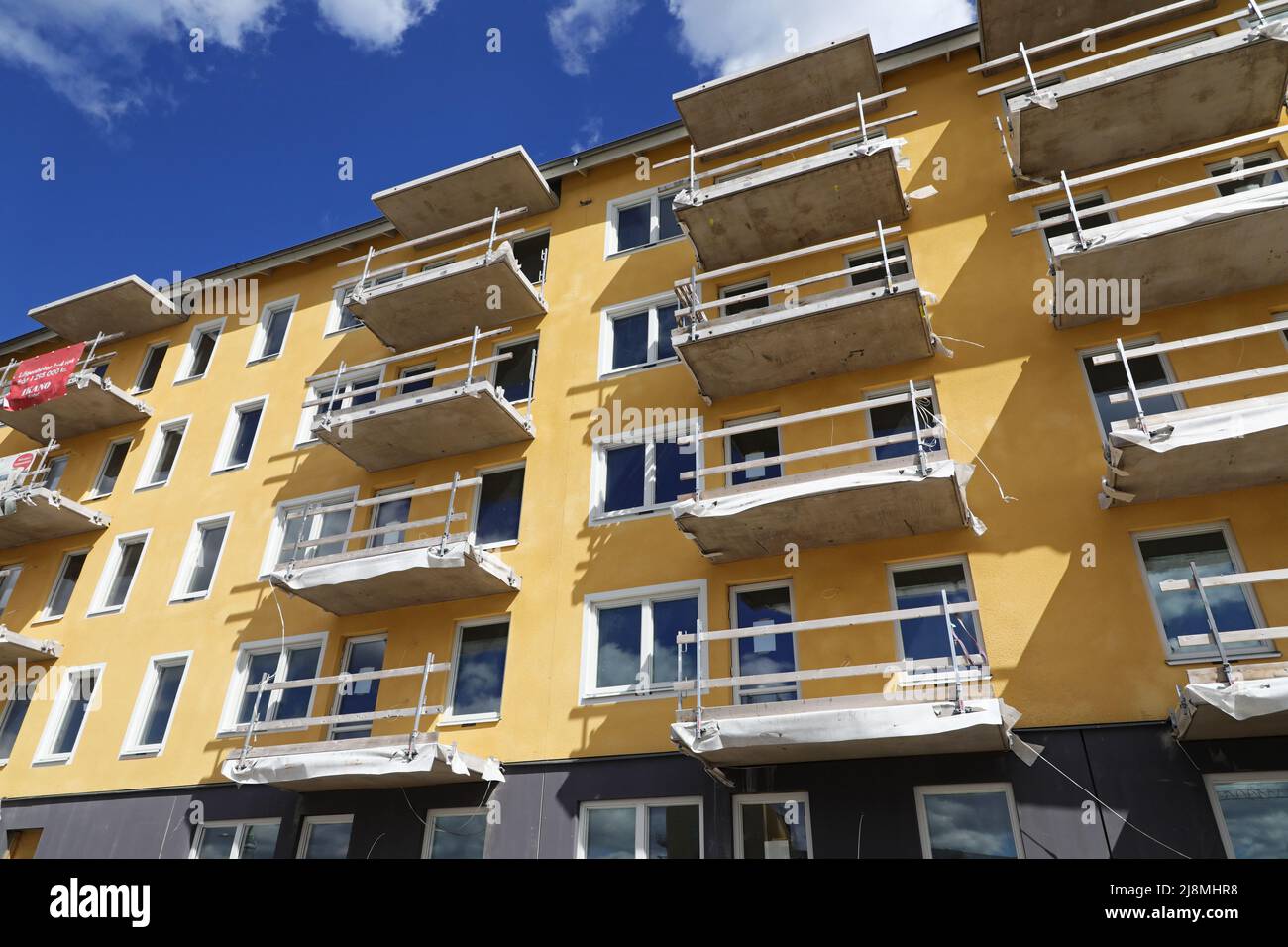Construction site in a residential area, Uppsala, Sweden. Modern apartments for Rikshem are