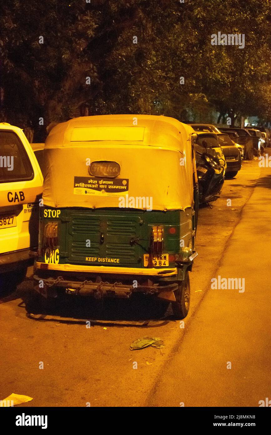 An old auto rickshaw in the night on street Stock Photo Alamy