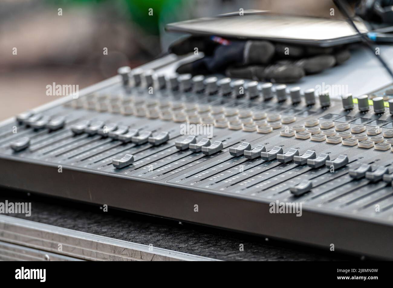 Sound and audio mixer control panel with buttons and sliders. Audio
