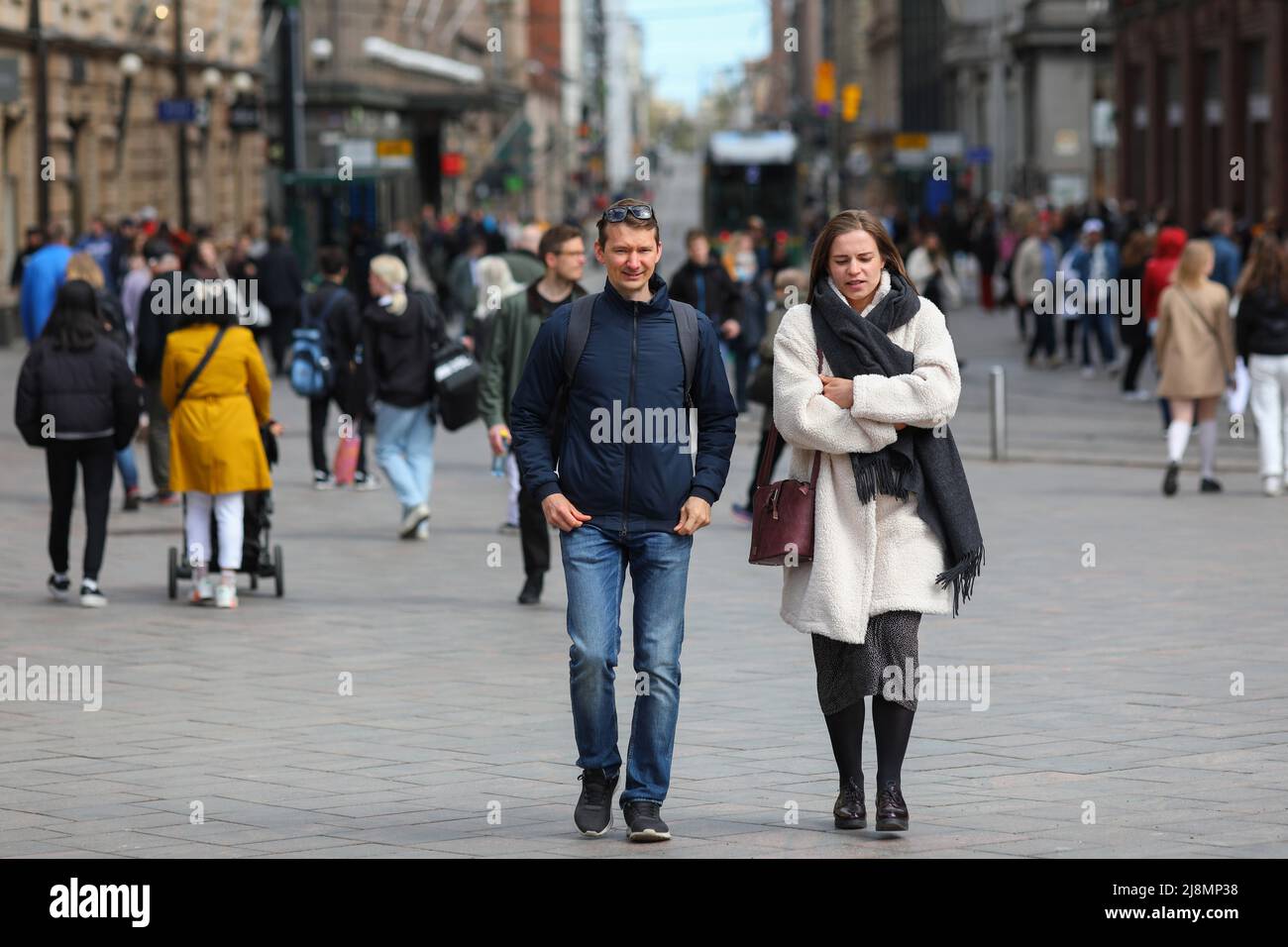 People walking on aleksanterinkatu street near stockmann department