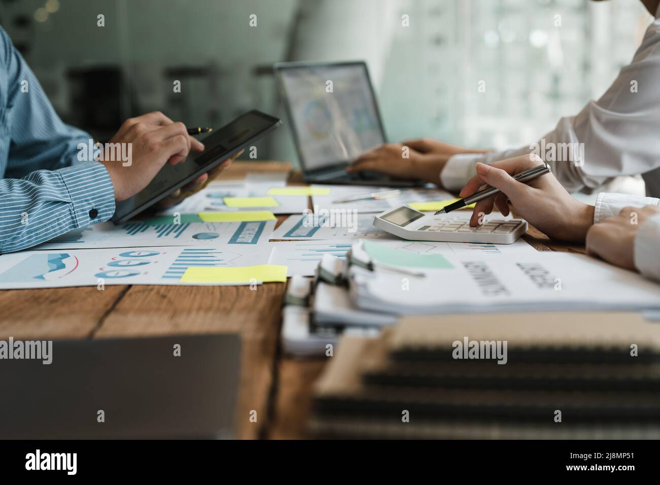 Business People Analyzing Statistics Business Documents, Financial Concept Stock Photo