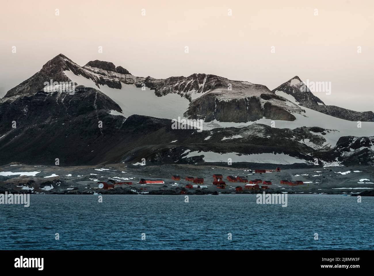 Scientific base with snowy mountains landscape, Antarctic Peninsula ...