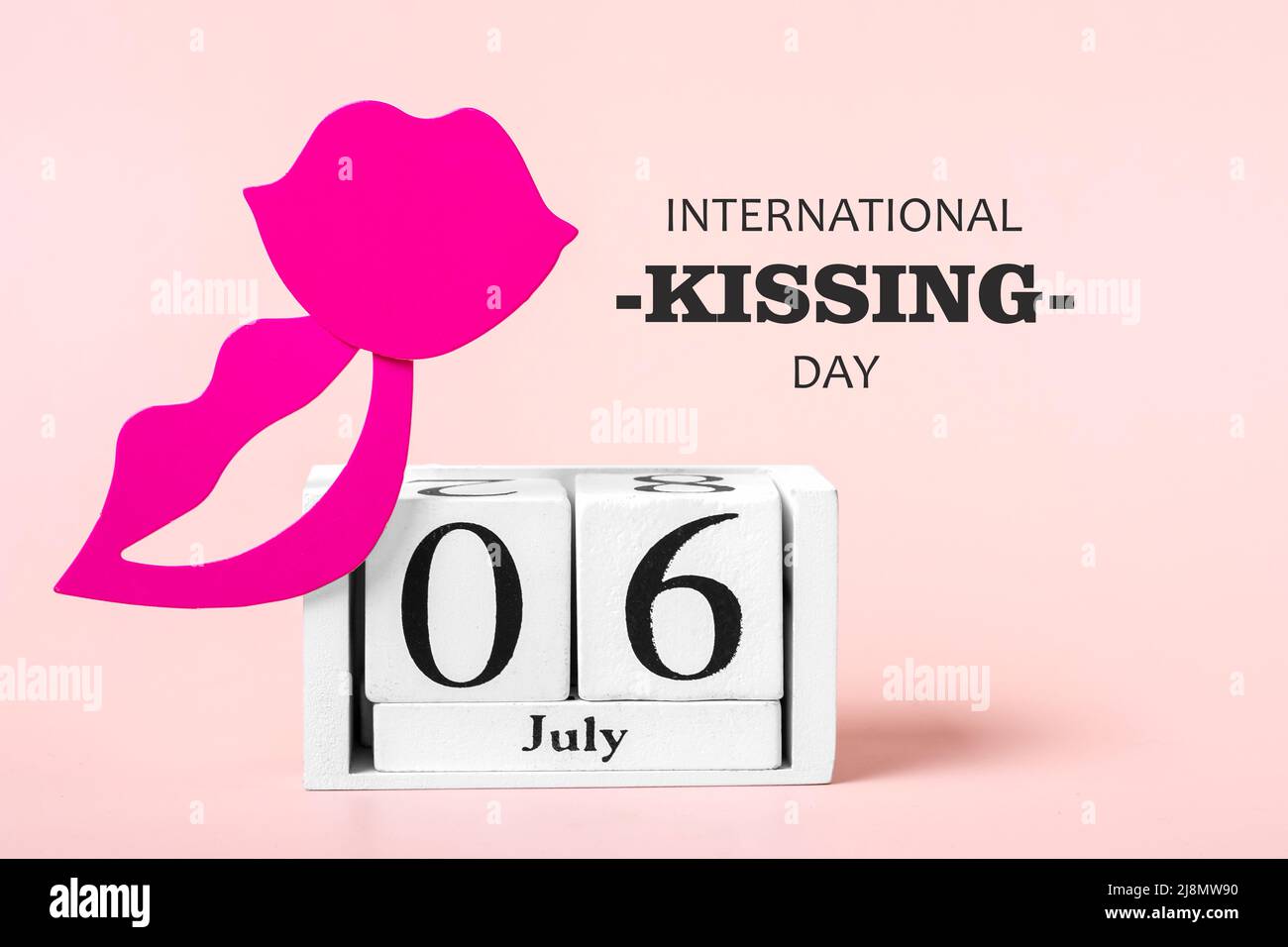 Red lips, calendar isolated on pink background 06 July - International Kissing Day concept Greeting holiday card. Stock Photo