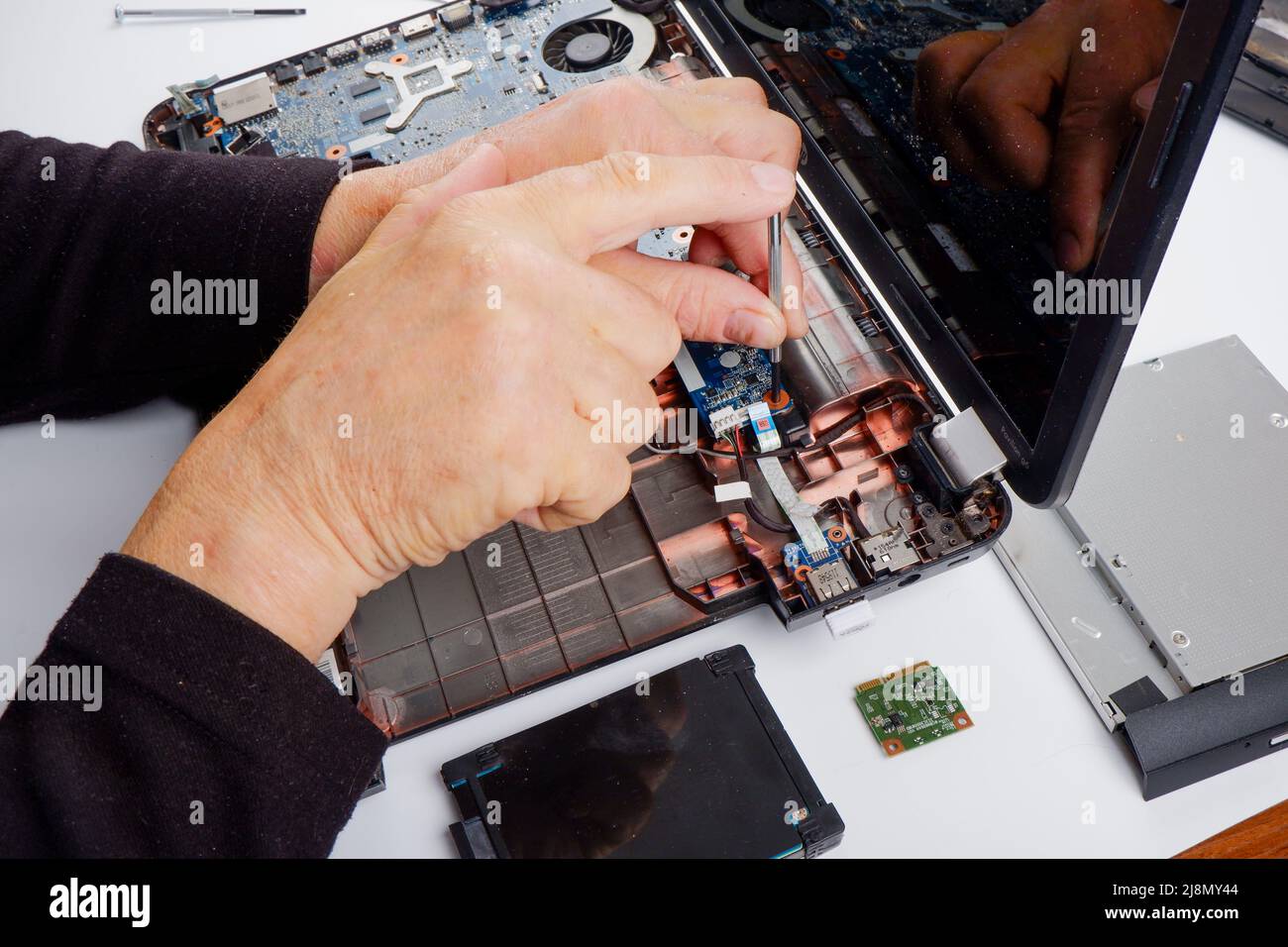 repairman phones smartphone humour mechanic engineer gadgets pro Stock  Photo - Alamy