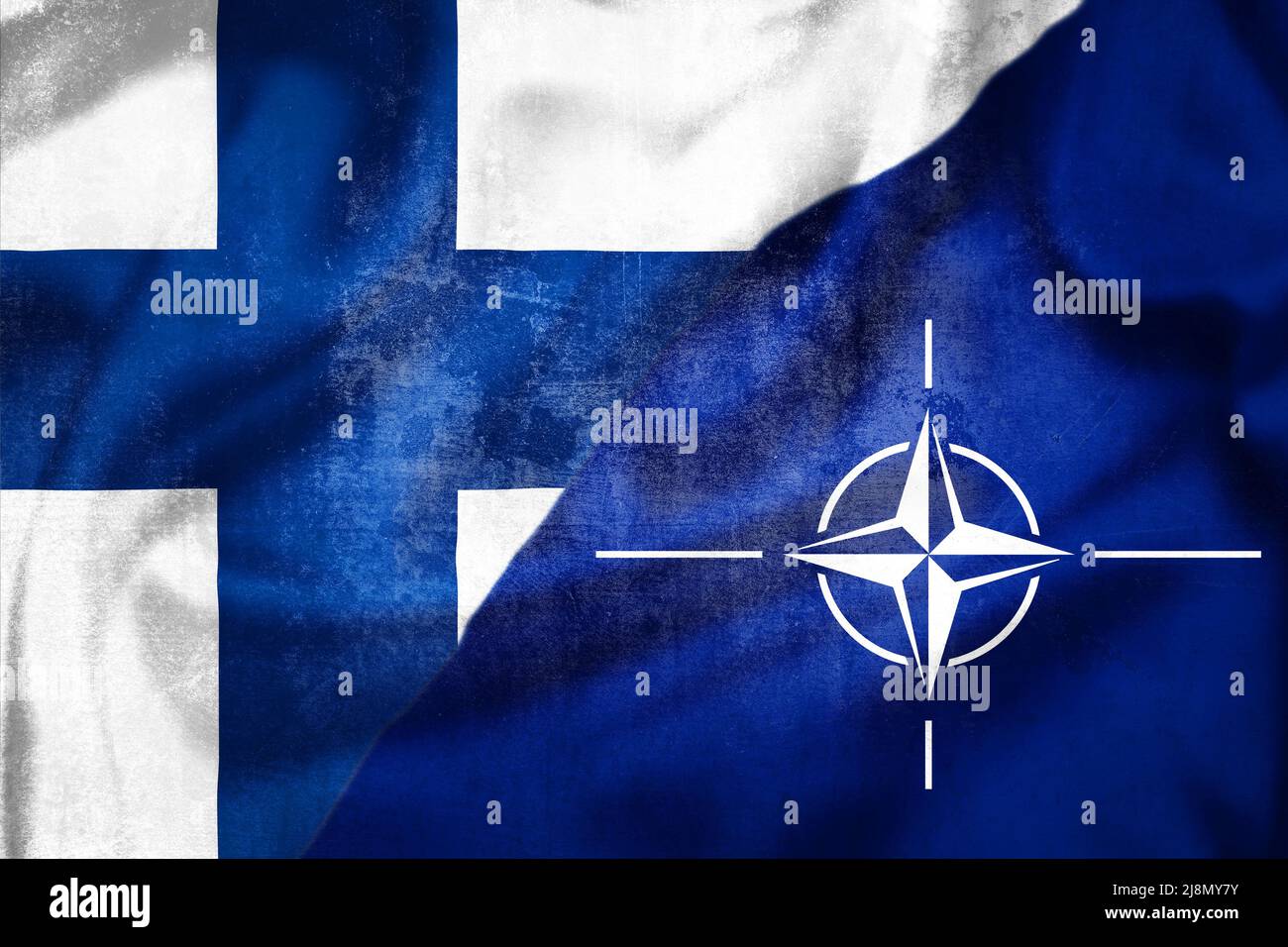 Helsinki, Finland - May 3 2022: Grunge flags of Finland and NATO illustration, concept of Finland plans to enter NATO Stock Photo