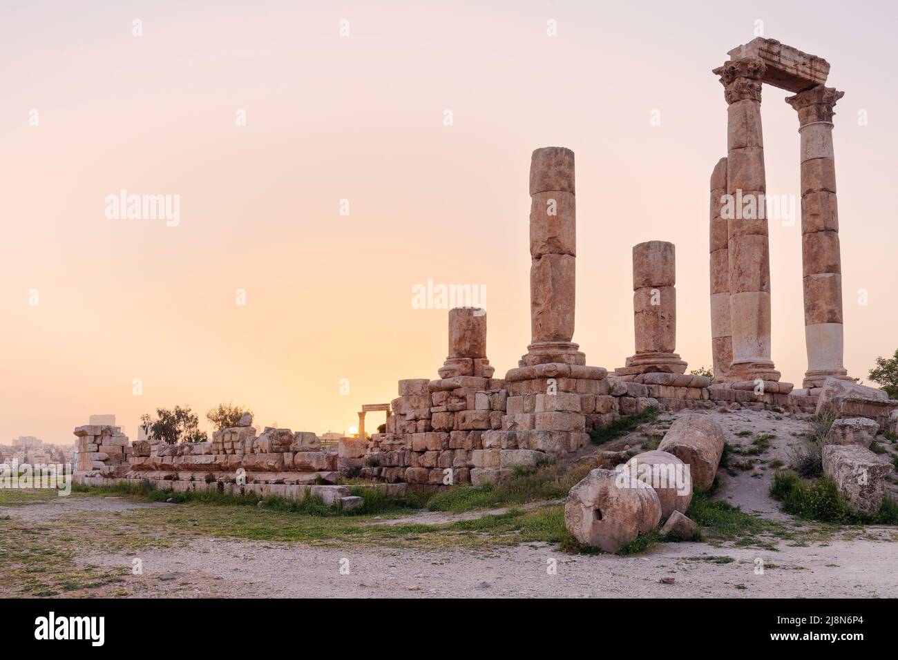 Amman, Jordan. Temple of Hercules, the Amman fortress ruins, Jabal al-Qal'a sunset colored light. Stock Photo