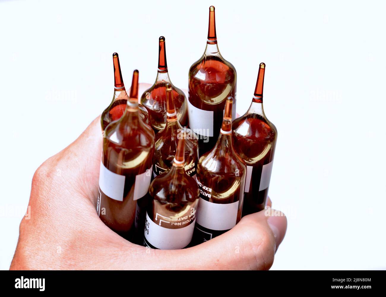Glass ampoules containing iron supplement solution to treat anaemia. Stock Photo