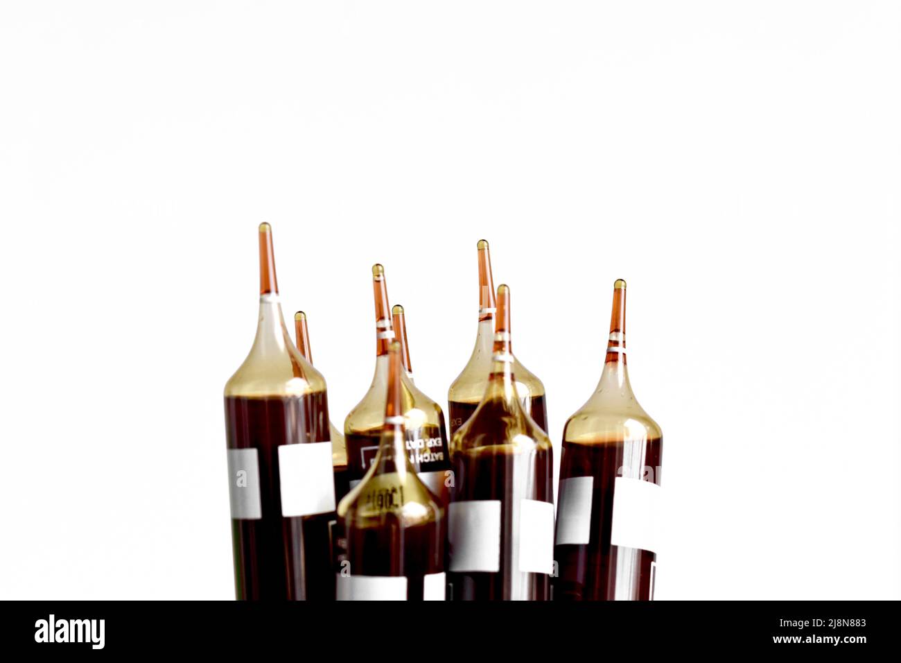 Glass ampoules containing iron supplement solution to treat anaemia. Stock Photo