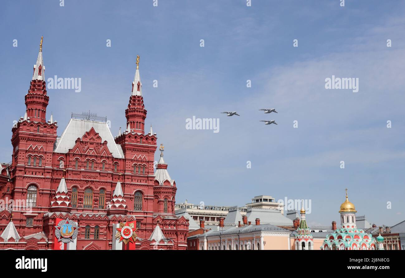 Moscow, Russia, May 2022: The flight in the sky of three IL-76MD heavy long-range military aircrafts in a blue sky. The main rehearsal of military par Stock Photo