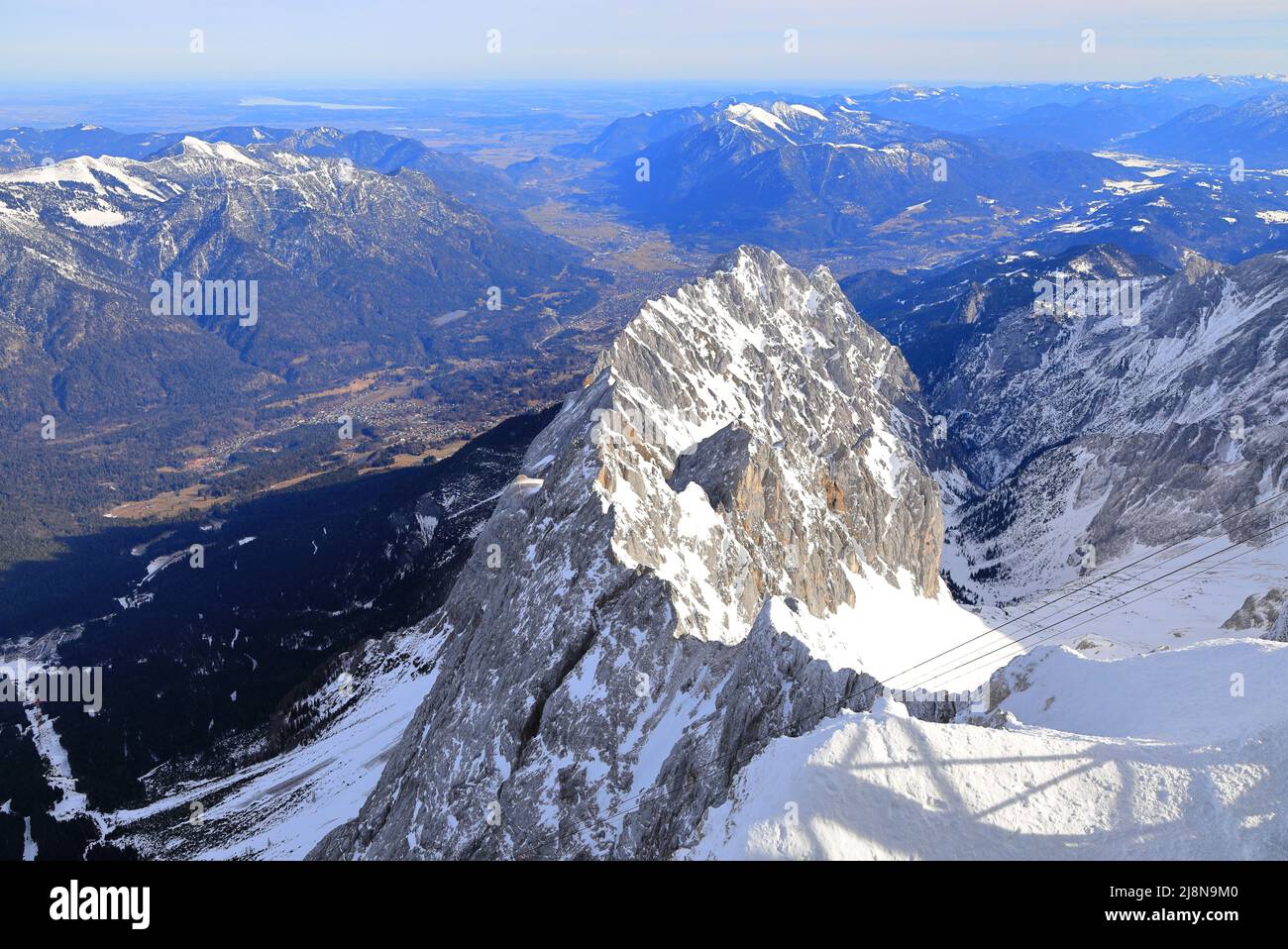 Panorama view of snow mountain from Zugspitze - the highest point of Germany. The Alps, Germany, Europe. Stock Photo
